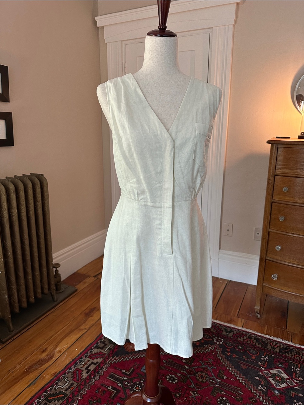 ModCloth Cream Linen V-Neck Sleeveless Pleated Mini Dress